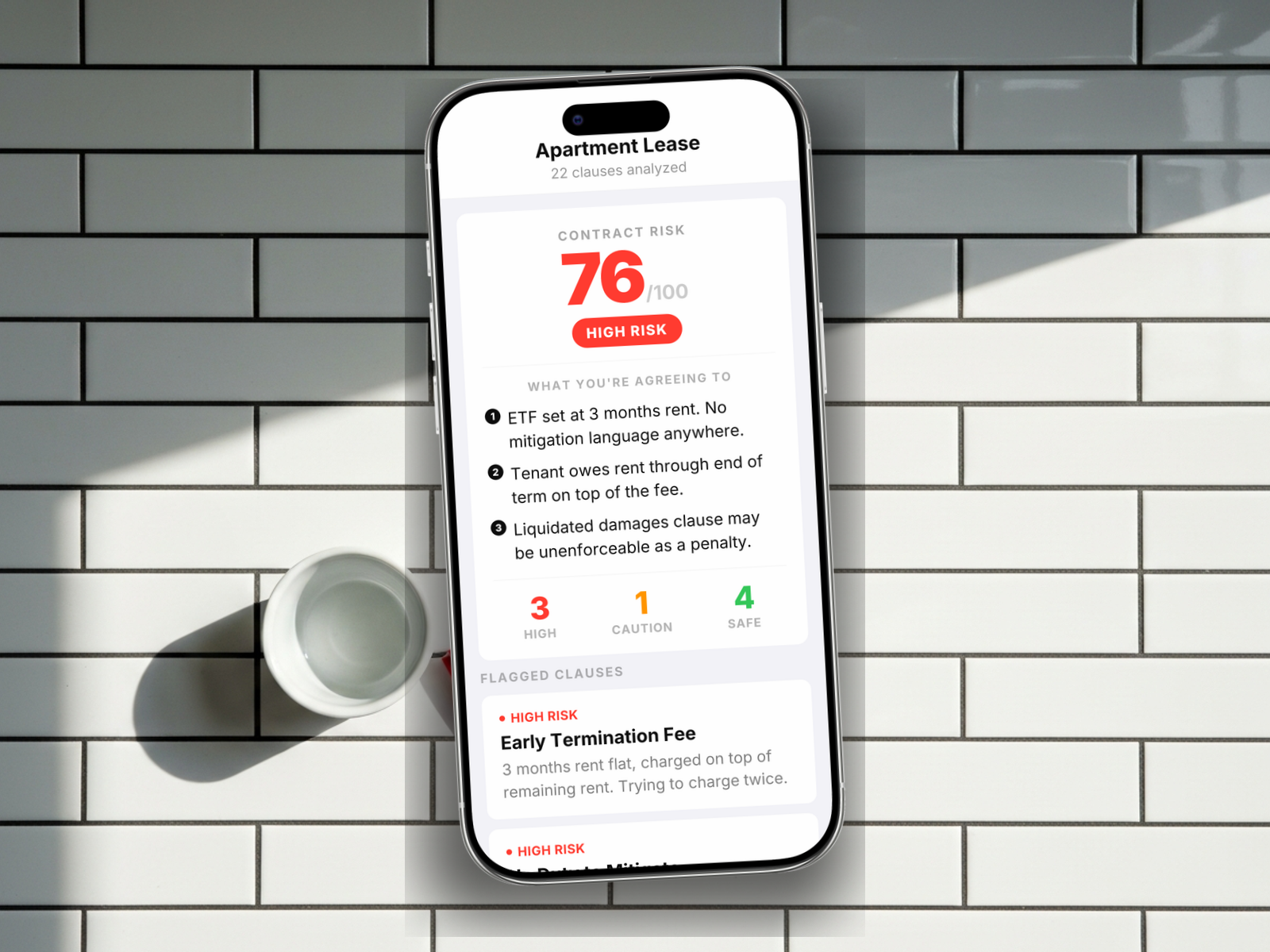 Redline scoring a apartment lease: 76/100, HIGH RISK, with early termination fee, no duty to mitigate, accrued through term, and liquidated damages flagged