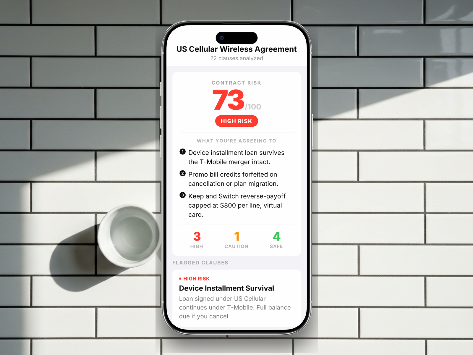 Redline scoring a US Cellular wireless agreement: 73/100, HIGH RISK, with device installment survival, promo credit clawback, migration ambiguity, and unlock-delay risk flagged